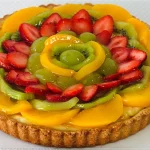 Aprende a hacer una colorida y refrescante tarta de frutas casera